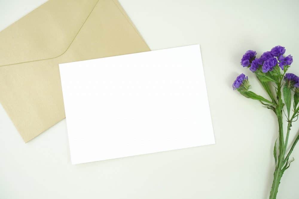 blank letter and envelope with flowers